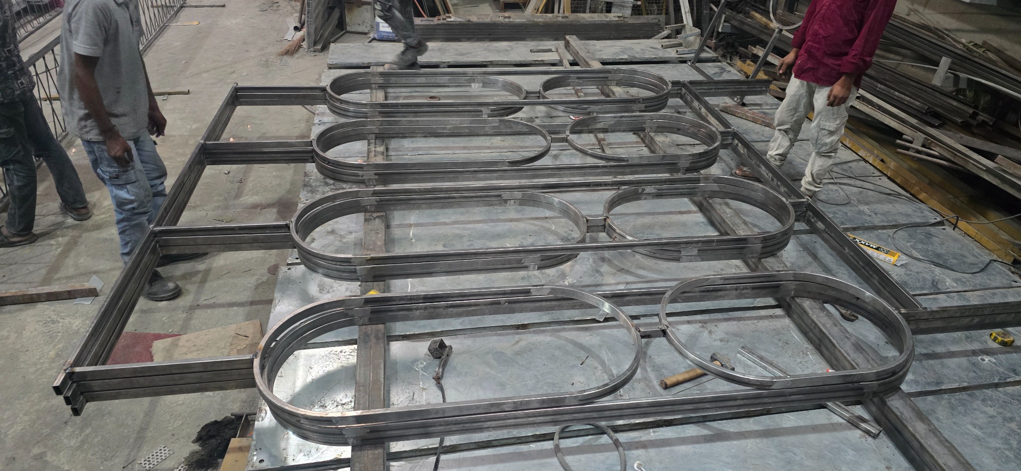 Repeating capsule metal modules being assembled