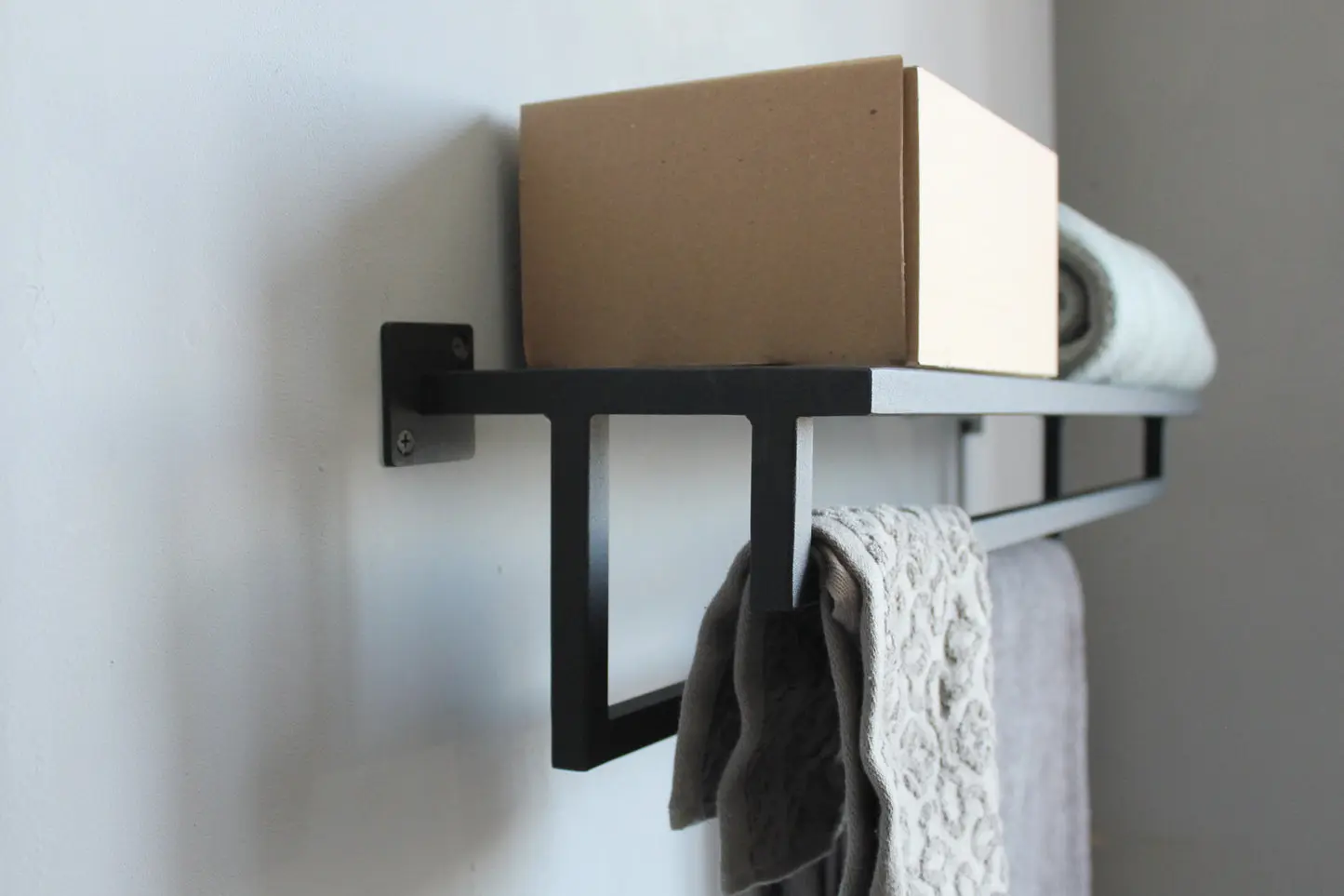 Minimal metal bath shelving for premium interiors